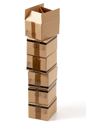 Classic cardboard boxes isolated over a white background.の写真素材