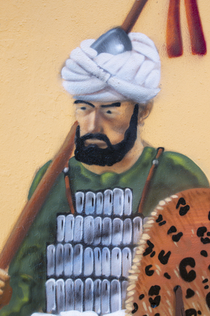SILVES, PORTUGAL - 11th AUGUST, 2018 - Artistic graffiti mural of medieval fair motifs.のeditorial素材