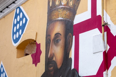 SILVES, PORTUGAL - 11th AUGUST, 2018 - Artistic graffiti mural of medieval fair motifs.のeditorial素材