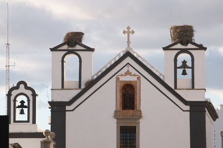 View of the landmark Convent Santo Antonio dos Capuchos located in Faro, Portugal.の写真素材