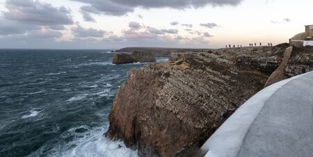Landscape of the coastline of Sagres with vegetation, rock formation on the furthest tip of southern Portugal.の写真素材