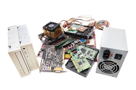 Close up view of various computer parts on a white background.