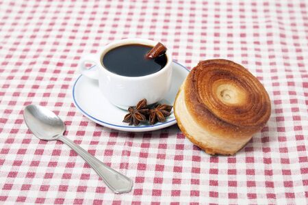 Rolled honey pastries with coffee, typical of Olhao city, Portugal.の写真素材