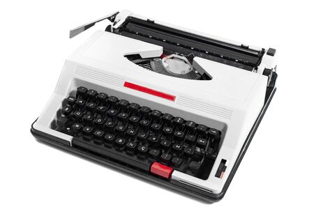 Vintage portable typewriter isolated on a white background.の写真素材