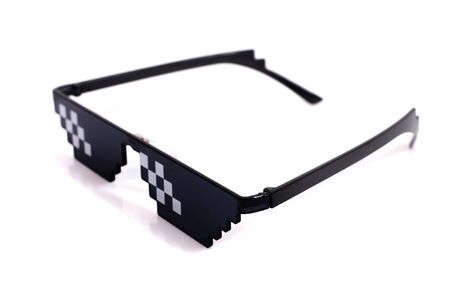 Close up view of meme pixel glasses isolated on a white background.の写真素材