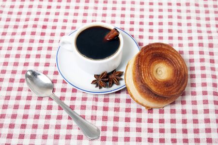 Rolled honey pastries with coffee, typical of Olhao city, Portugal.の写真素材