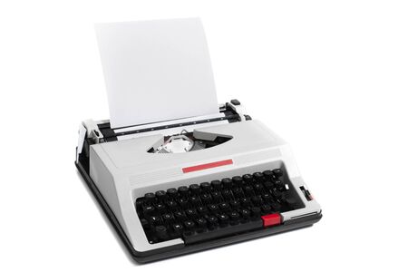 Vintage portable typewriter isolated on a white background.の写真素材