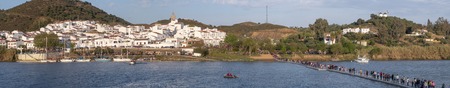 ALCOUTIM, PORTUGAL: MARCH 30, 2019: Festival of smuggling (contrabando), where many people cross the river to the other side, to Sanlucar de Guadiana, Huelva, Andalusia, Spain.のeditorial素材