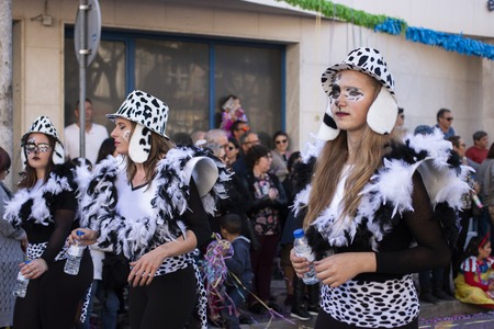 LOULE, PORTUGAL - MAR 2019: Colorful Carnival (Carnaval) Parade festival participants on Loule city, Portugal.のeditorial素材