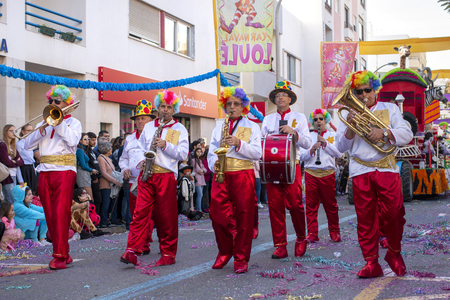 LOULE, PORTUGAL - MAR 2019: Colorful Carnival (Carnaval) Parade festival participants on Loule city, Portugal.のeditorial素材