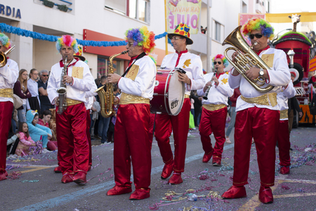 LOULE, PORTUGAL - MAR 2019: Colorful Carnival (Carnaval) Parade festival participants on Loule city, Portugal.のeditorial素材
