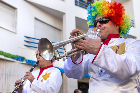 LOULE, PORTUGAL - MAR 2019: Colorful Carnival (Carnaval) Parade festival participants on Loule city, Portugal.のeditorial素材