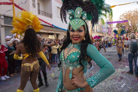 LOULE, PORTUGAL - MAR 2019: Colorful Carnival (Carnaval) Parade festival participants on Loule city, Portugal.のeditorial素材