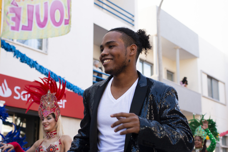 LOULE, PORTUGAL - MAR 2019: Colorful Carnival (Carnaval) Parade festival participants on Loule city, Portugal.のeditorial素材