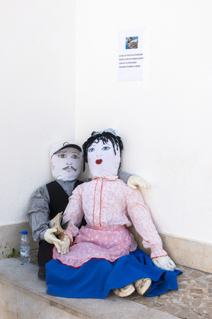 CONCEICAO, PORTUGAL - MAY 1, 2019: Ancient tradition of handmade dolls called Maios / Maias, celebrating the arrival of Spring, land fertility and the beginning of life, located on the Algarve region, the south of Portugal.のeditorial素材