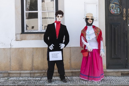 ESTOI, PORTUGAL - MAY 1, 2019: Ancient tradition of handmade dolls called Maios / Maias, celebrating the arrival of Spring, land fertility and the beginning of life, located on the Algarve region, the south of Portugal.のeditorial素材