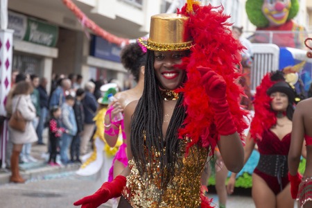 LOULE, PORTUGAL - MAR 2019: Colorful Carnival (Carnaval) Parade festival participants on Loule city, Portugal.のeditorial素材