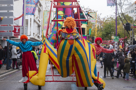 LOULE, PORTUGAL - MAR 2019: Colorful Carnival (Carnaval) Parade festival participants on Loule city, Portugal.のeditorial素材