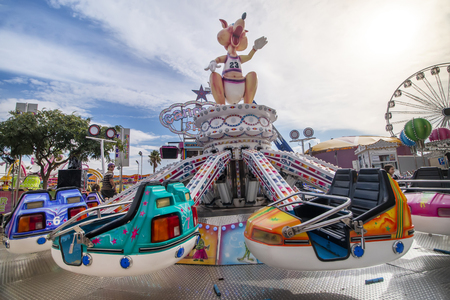 FARO, PORTUGAL - OCTOBER  2018: Fun fair event Santa Iria with games, street food, ferry wheels, bumper cars and many diverse activities.のeditorial素材