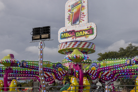 FARO, PORTUGAL - OCTOBER  2018: Fun fair event Santa Iria with games, street food, ferry wheels, bumper cars and many diverse activities.のeditorial素材