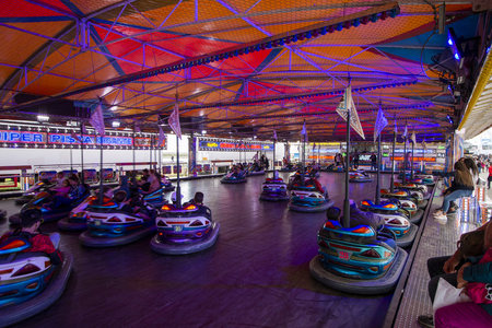 FARO, PORTUGAL - OCTOBER  2018: Fun fair event Santa Iria with games, street food, ferry wheels, bumper cars and many diverse activities.のeditorial素材
