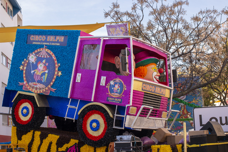 LOULE, PORTUGAL - MAR 2019: Colorful Carnival (Carnaval) Parade festival participants on Loule city, Portugal.のeditorial素材