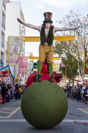 LOULE, PORTUGAL - MAR 2019: Colorful Carnival (Carnaval) Parade festival participants on Loule city, Portugal.のeditorial素材