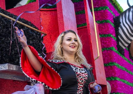 LOULE, PORTUGAL - MAR 2019: Colorful Carnival (Carnaval) Parade festival participants on Loule city, Portugal.のeditorial素材
