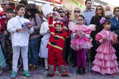 LOULE, PORTUGAL - MAR 2019: Colorful Carnival (Carnaval) Parade festival participants on Loule city, Portugal.のeditorial素材