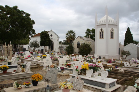SAO BRAS DE ALPORTEL, PORTUGAL: 7th of November, 2018 - Wide view of a cemetary with tombs, crypts and flowers.のeditorial素材