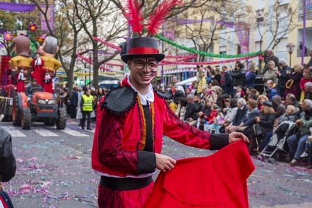 LOULE, PORTUGAL - MAR 2019: Colorful Carnival (Carnaval) Parade festival participants on Loule city, Portugal.のeditorial素材