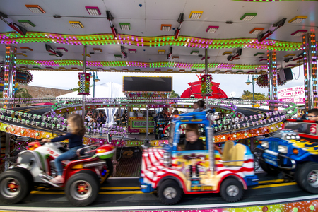 FARO, PORTUGAL - OCTOBER  2018: Fun fair event Santa Iria with games, street food, ferry wheels, bumper cars and many diverse activities.のeditorial素材
