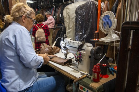 FARO, PORTUGAL - OCTOBER  2018: Fun fair event Santa Iria with games, street food, ferry wheels, bumper cars and many diverse activities.のeditorial素材