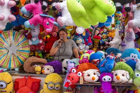 FARO, PORTUGAL - OCTOBER  2018: Fun fair event Santa Iria with games, street food, ferry wheels, bumper cars and many diverse activities.のeditorial素材