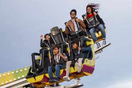 FARO, PORTUGAL - OCTOBER  2018: Fun fair event Santa Iria with games, street food, ferry wheels, bumper cars and many diverse activities.のeditorial素材