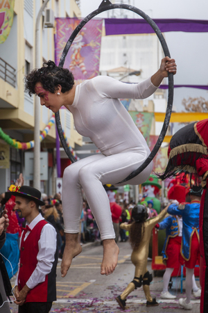LOULE, PORTUGAL - MAR 2019: Colorful Carnival (Carnaval) Parade festival participants on Loule city, Portugal.のeditorial素材