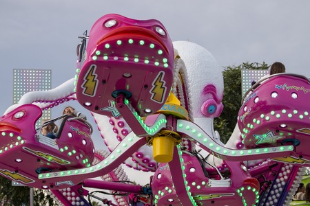 FARO, PORTUGAL - OCTOBER  2018: Fun fair event Santa Iria with games, street food, ferry wheels, bumper cars and many diverse activities.のeditorial素材