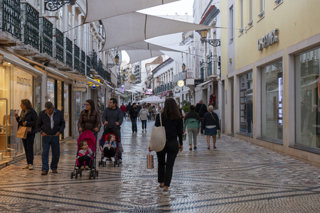 FARO, PORTUGAL: 20th OCTOBER, 2018 - Street of Santo Antonio in Faro city that includes many stores, and beautiful cobblestone artwork.のeditorial素材