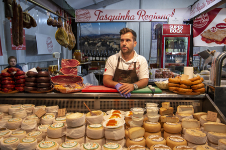 FARO, PORTUGAL - OCTOBER  2018: Fun fair event Santa Iria with games, street food, ferry wheels, bumper cars and many diverse activities.のeditorial素材