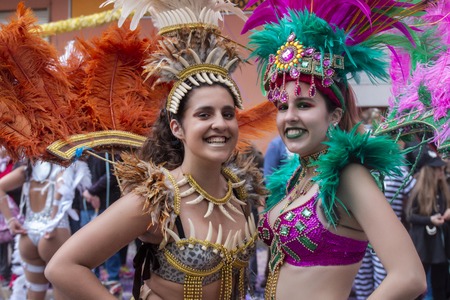LOULE, PORTUGAL - MAR 2019: Colorful Carnival (Carnaval) Parade festival participants on Loule city, Portugal.のeditorial素材