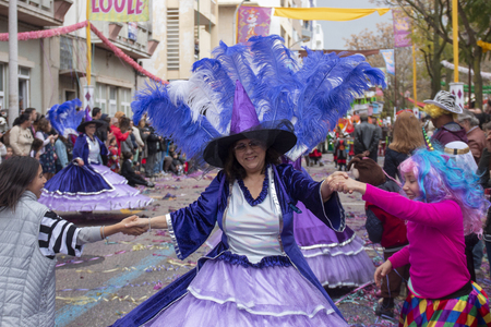 LOULE, PORTUGAL - MAR 2019: Colorful Carnival (Carnaval) Parade festival participants on Loule city, Portugal.のeditorial素材