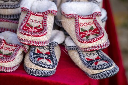 Traditional moroccan shoes at sale on a medieval fair event.の写真素材