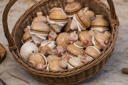 Old traditional tops with white string with iron tip.の写真素材
