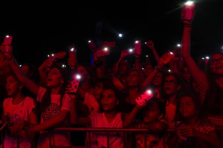 FARO, PORTUGAL: 5th SEPTEMBER, 2019 - Audience watch music artist on  Festival F, a big festival on...