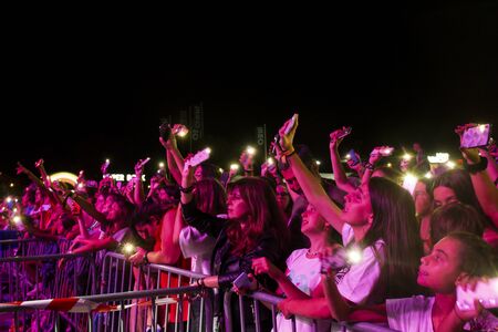 FARO, PORTUGAL: 5th SEPTEMBER, 2019 - Audience watch music artist on  Festival F, a big festival on...