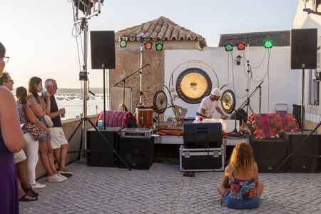FARO, PORTUGAL: 5th SEPTEMBER, 2019 - Music band, Cosmic Gong Bath - Sound Journey, performs on Festival F, a big festival on the city of Faro, Portugal.のeditorial素材