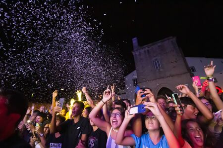FARO, PORTUGAL: 6th SEPTEMBER, 2019 - Audience watch music artist on  Festival F, a big festival on...