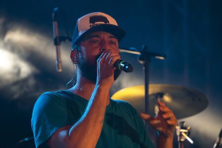 LOULE, PORTUGAL: 31st AUGUST, 2019 - Music artist, Gabriel o Pensador, performs on White Night, a festival on the city of Loule, Portugal.のeditorial素材