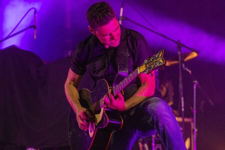 FARO, PORTUGAL: 10th AUGUST, 2019 - Correcaminos,  a rockabilly music band, performs on American...