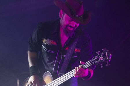 FARO, PORTUGAL: 10th AUGUST, 2019 - Correcaminos,  a rockabilly music band, performs on American...